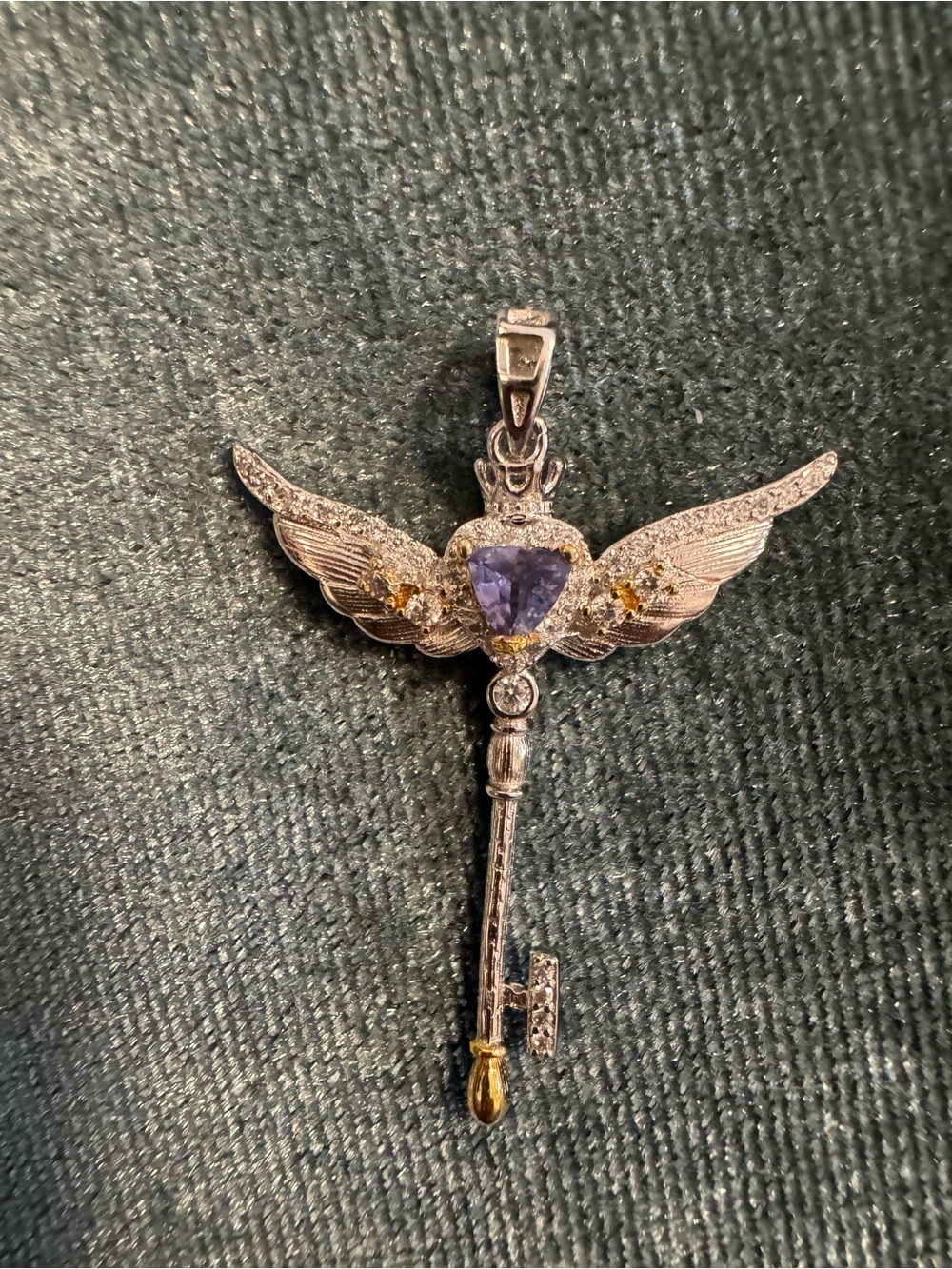925 silver tanzanite pendant winged key trillion